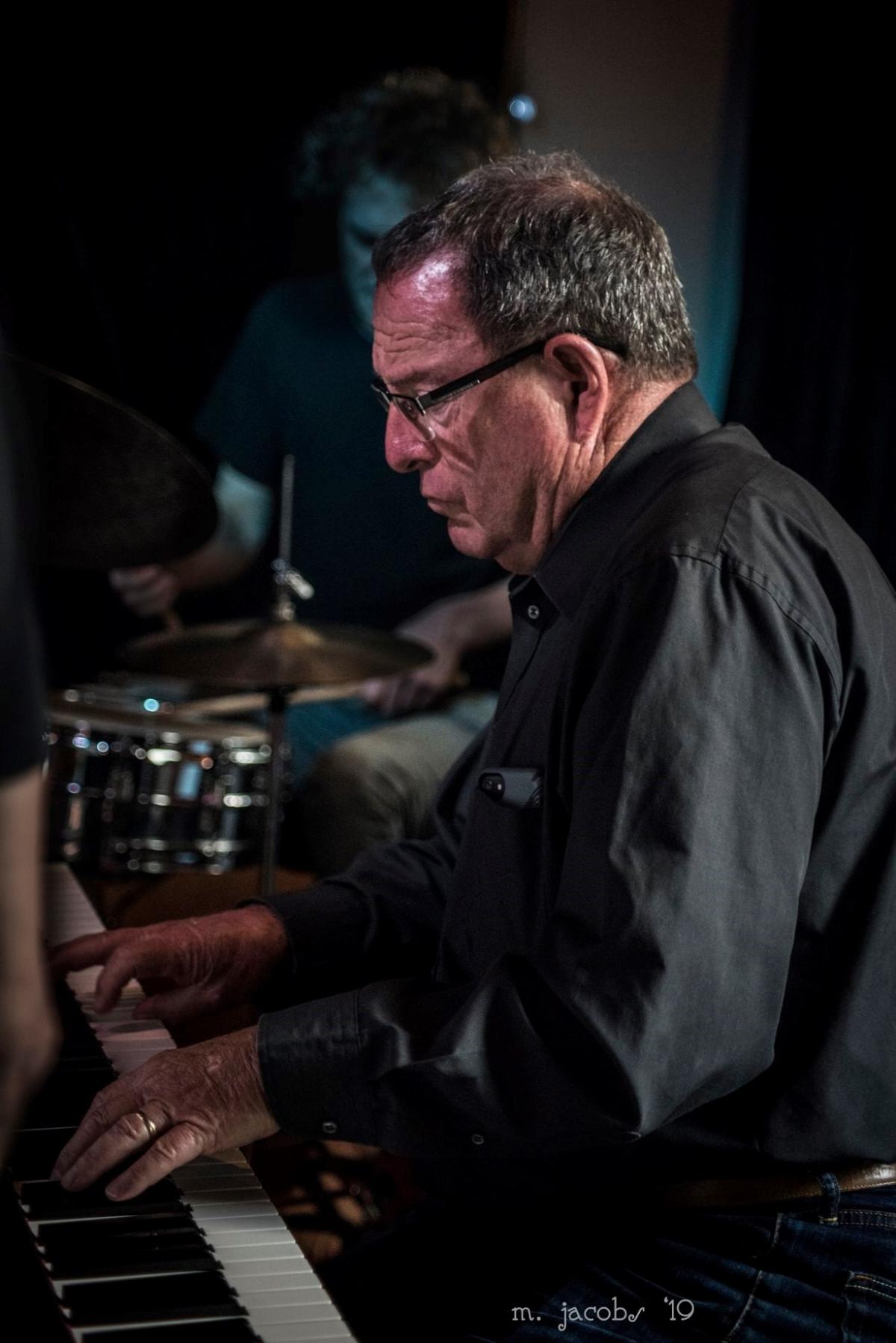 Nick Birchler playing piano