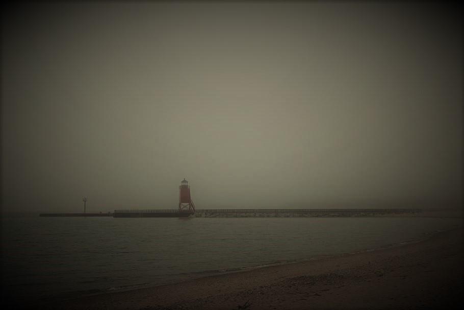 Foggy night with lighthouse